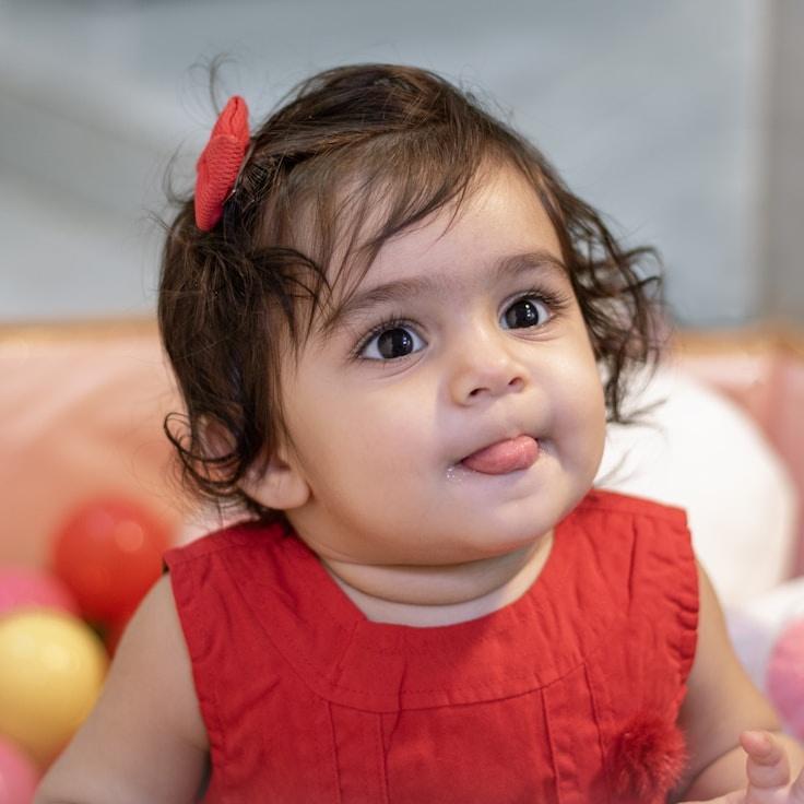 Kaveri Mehta, Lead Design Curator at CircleMarketEmber, reviewing corporate floral arrangements